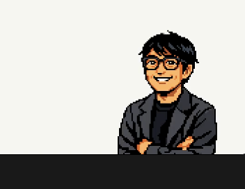 エイイチが最初に持ってきたドット絵。黒髪に眼鏡、黒いインナーに灰色のジャケットで腕を組んでいる