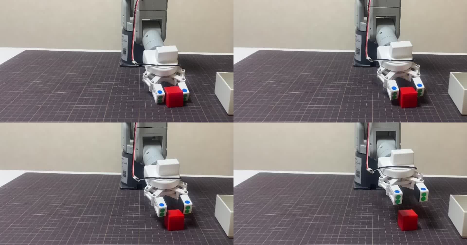 3回目を横から撮った動画のコマ。左上は爪がブロックをつかんでいる所、右上は少し持ち上がった所、左下はブロックが爪の間から下がっている所、右下はブロックが机に残り、爪だけが上がった所